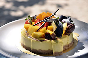 cheesecake with fruit and decoration on top